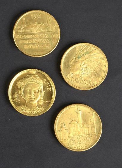 null 1931. Exposition coloniale internationale de Paris 1931. 4 médailles en bronze...