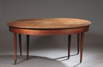 null Table, fin de l'époque Louis XVI
En bois naturel mouluré à bandeau, elle repose...