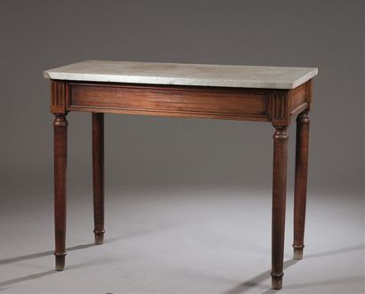 null Console, late Louis XVI
period In natural wood, moulded and carved, the high...