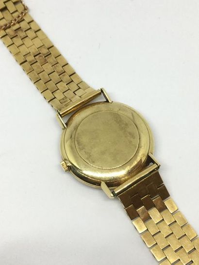 null OMEGA. Men's bracelet watch in gold. Circa 1960. Mechanical movement. Dater...