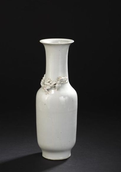 null White porcelain vase
China, 18th-19th century
Baluster-shaped, with relief decoration...