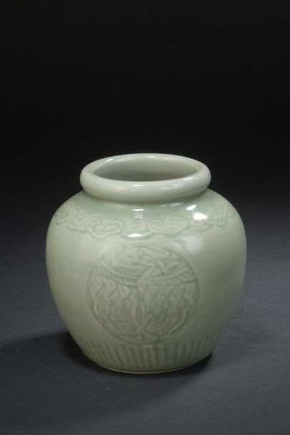 null Small celadon glazed stoneware vase
China, 20th century
The globular body, with...
