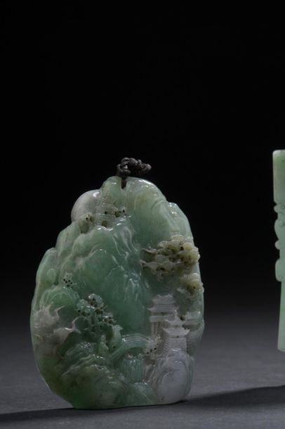 null Jadeite pendant
China, 20th century
In the shape of a mountain, decorated in...