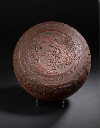 null Covered box in red lacquer
China, late eighteenth century
Circular in shape,...