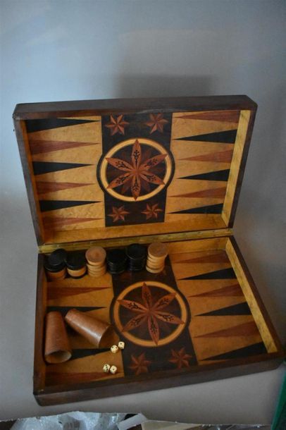 null Tric-trac or backgammon in a mahogany box, late 19th century, early 20th century
Label...