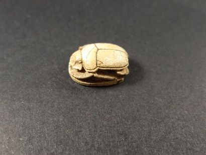 null Soapstone scarab, Egypt, Late Period, 712-30 B.C.
Engraved from the Menkheperu
cartouche...