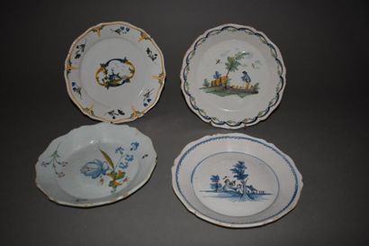 null Nevers, set of four earthenware plates, 18th century
With scrolled edges and...
