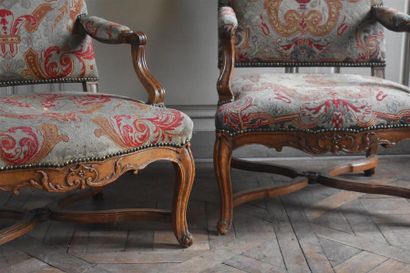 null Two Regency
period moulded and carved natural wood armchairs with gendarme hat...