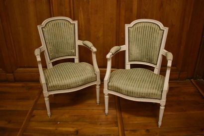 null Pair of Louis XVI
style painted wooden armchairs with convertible backrest resting...