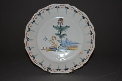 null Nevers, assiette révolutionnaire en faïence, XVIIIe siècle
A décor polychrome...