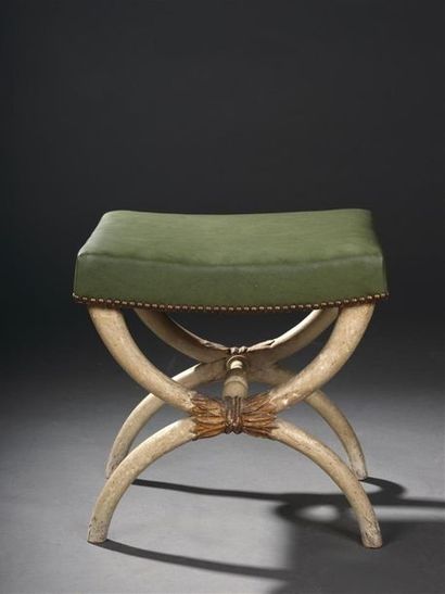 null Folding stool in moulded and carved wood from the Directoire
period. The legs...