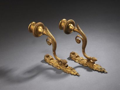 null Pair of Directoire
period chased and gilt bronze sconces with a light resting...