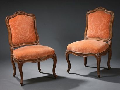 null Pair of flat back chairs in moulded and carved wood attributed to J. Avisse...