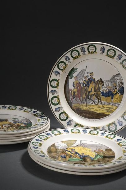 null Montereau, circa 1825
Suite of nine fine earthenware plates decorated
with Greek...