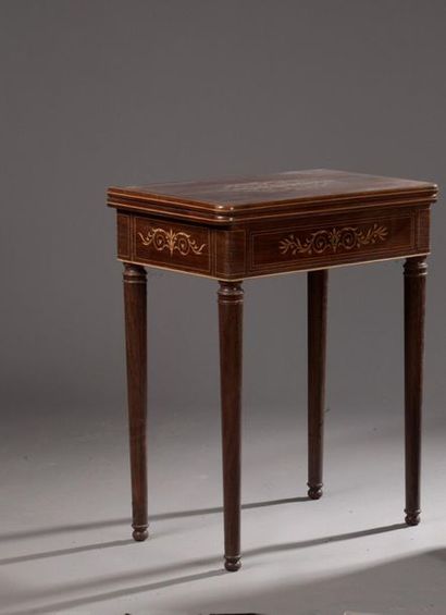 null Game table in rosewood veneer and light wood mesh from the Charles X
period....