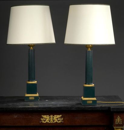 null Pair of Restoration period Carcel lamps in green lacquered sheet metal, chased...