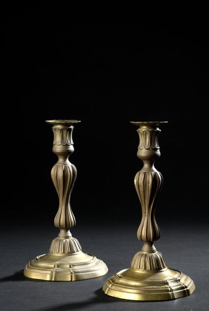 null Pair of torches "Au modèle du roi" from the Louis XV
period In chased bronze,...