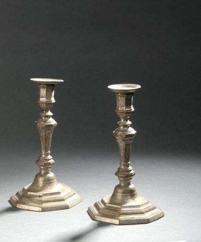 null Pair of silvered bronze torches from the Louis XV
period. The shaft with sides...