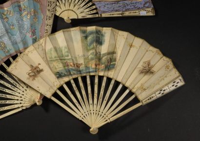 null Reunion of four fans, 19th century
Three folded fans with bone and ivory mounts;...