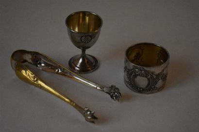 null Set includes one sugar tongs, one egg cup and one silver napkin tie, Minerva...