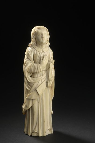 null GOA, XVIIe siècle
Saint évangéliste en ivoire sculpté
Accidents.
H. 21 cm 
...
