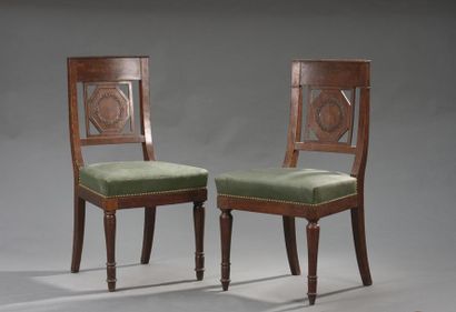 null Pair of Empire period mahogany and mahogany veneer chairs
The openwork backrest...