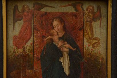 null In the taste of Van EYCK
Virgin and Child in front of a gold brocade
Oak panel.
Old...