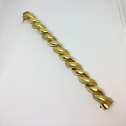 Bracelet en or 750 , à deux larges brins...