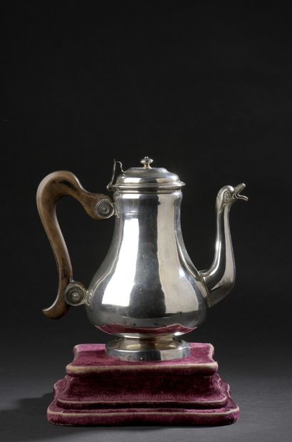  A silver pot with a black-stained pearwood...