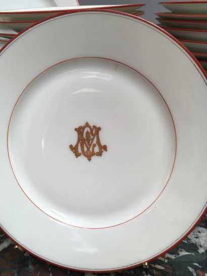 null Part of a table service in coral net porcelain monogrammed CM, late 19th century

It...