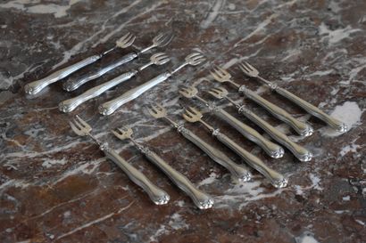 null 12 fourchettes à huitre en métal argenté