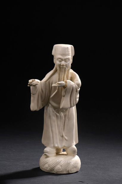null Deux statuettes de Guanyin et Shouloa en porcelaine blanc de Chine 

Chine,...