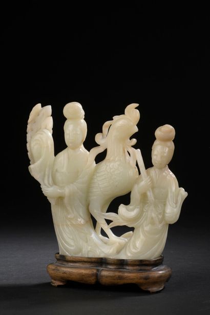 Groupe en jade céladon pâle sculpté

Chine,...