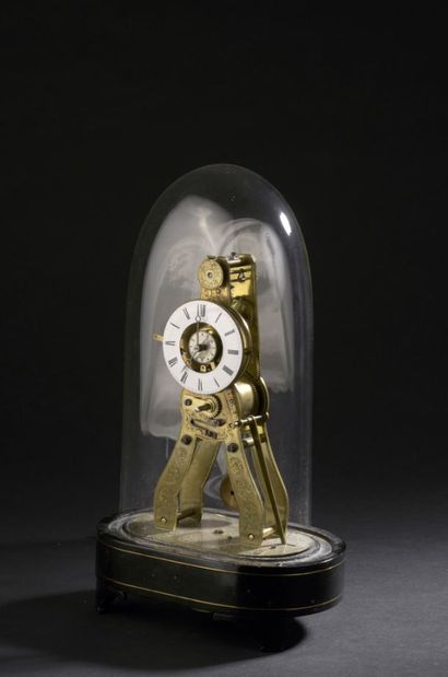 Engraved brass skeleton clock with openwork...