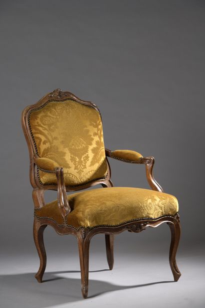 Louis XV period moulded and carved wood armchair...