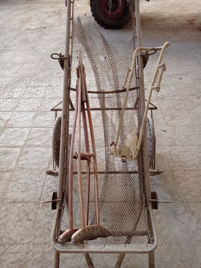  Stretcher mounted on a trolley with orthopaedic parts.