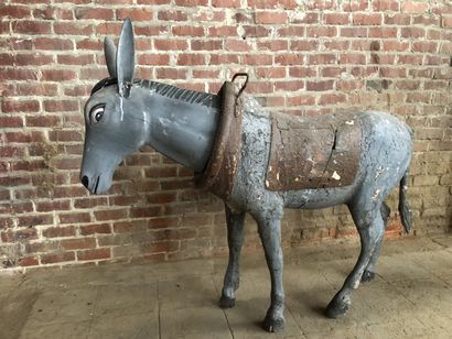 null Carousel donkey, 19th century. Carved lacquered wood with metal trim. The head...
