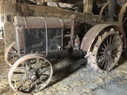 null Agricultural tractor with iron wheels. Brand Fordson. L.320 l.160 cm In the...