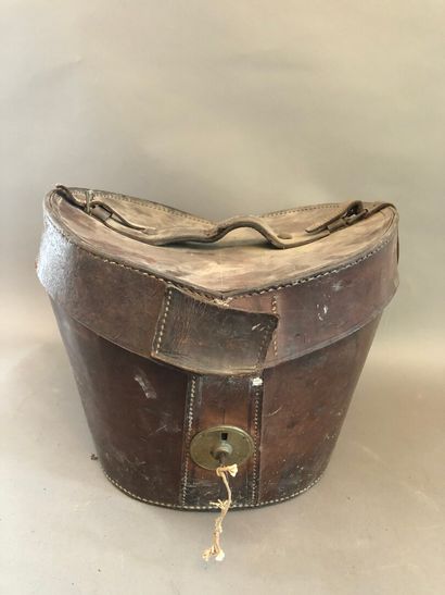 Leather hat box with its interior lined and...