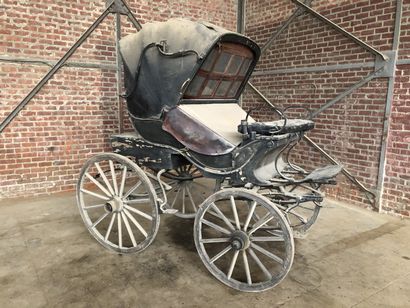 null Phaeton cabriolet with four wheels, circa 1850. The body has a curved profile...