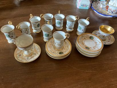 PARTIE DE SERVICE A CAFE Part of a porcelain coffee set comprising

eleven cups and...