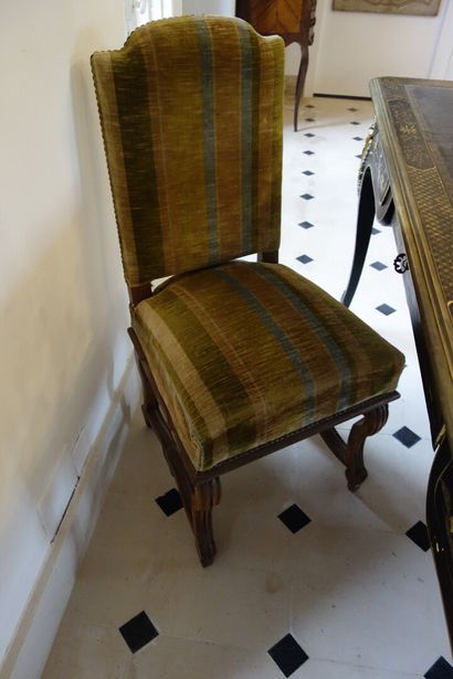 null A suite of six Regency style molded fruitwood chairs

Regency style, 19th century

Legs...
