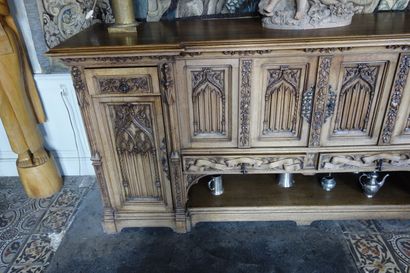 ENFILADE Style néogothique Moulded and carved fruitwood sideboard, Neo-Gothic style,...