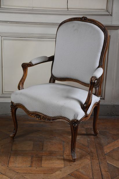 A Louis XV period moulded and carved natural...
