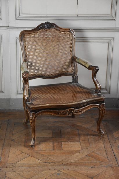 Louis XV period natural wood flat-back armchair...