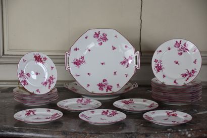 null Limoges porcelain service by Raynaud 

Decorated in pink monochrome with flowers,...