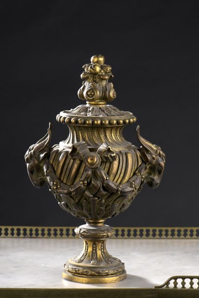  A Napoleon III period gilt and chased bronze staircase vase 
Decorated with a goat's...