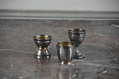 Three silver eggcups hallmarked Minerve 
One...