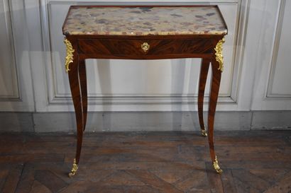 null A Louis XV period rosewood veneer console table stamped J. F DUBUT

Opening...