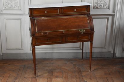 null 
Louis XVI period mahogany veneered cylinder desk 




Opening to a cylinder,...